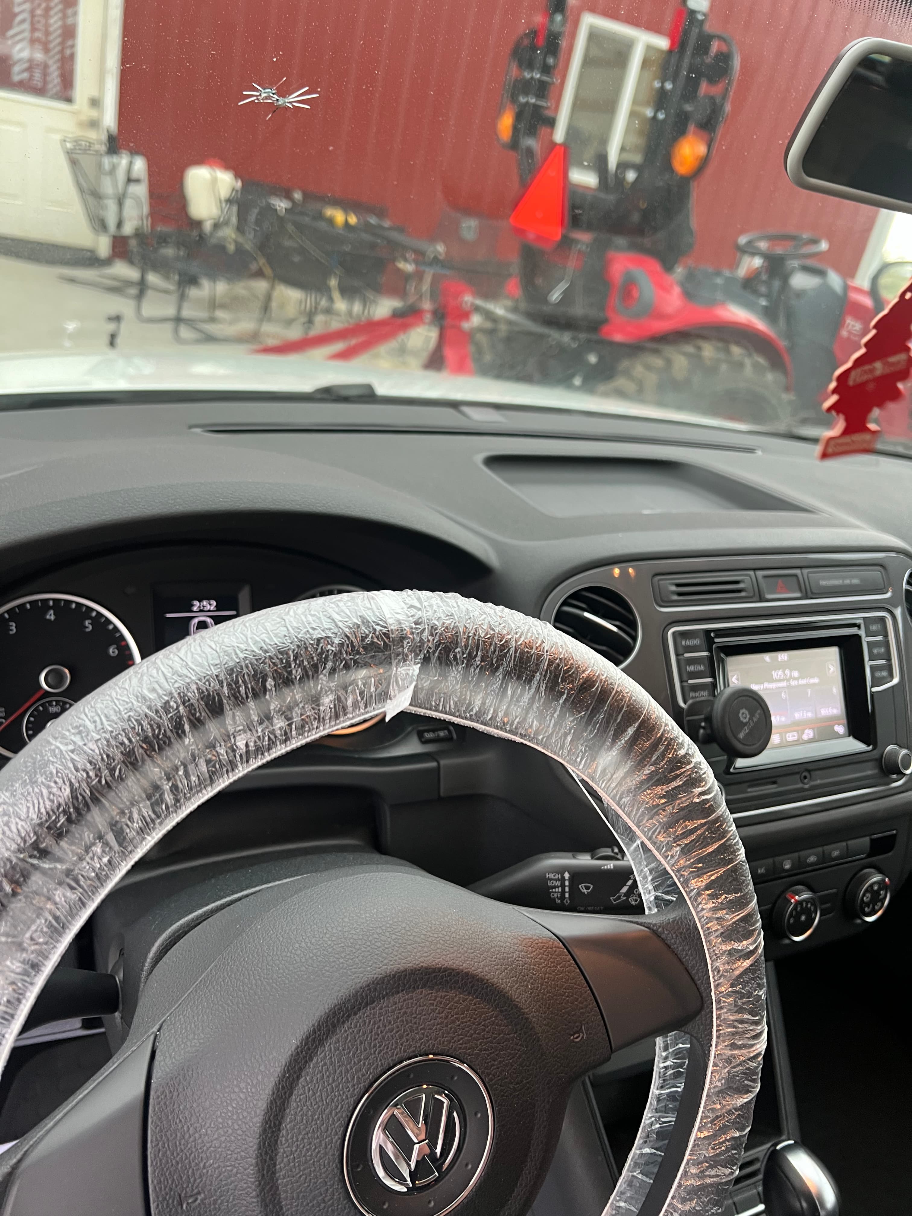 Before detailing - dirty steering wheel with worn cover and accumulated grime in Loveland, Colorado